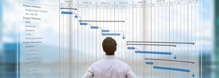 Project manager looking at AR screen, Gantt chart schedule, plan Project manager looking at AR screen with Gantt chart schedule or planning showing tasks and deadlines