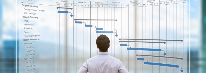 Project manager looking at AR screen with Gantt chart schedule or planning showing tasks and deadlines